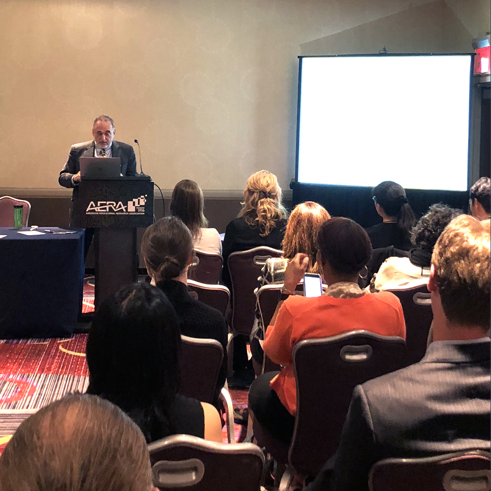 photo of Denis Newman presenting at AERA 2018